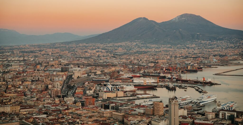 Naples at sunset with Mount Vesuvius in the background